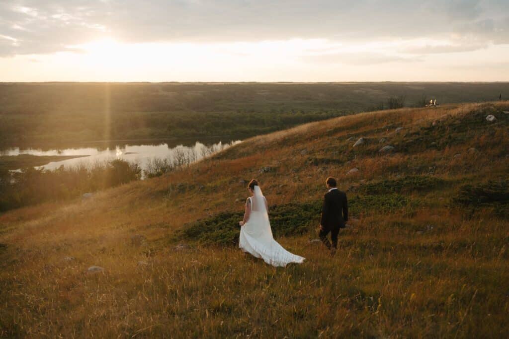 A newly married couple in the river hills at Blue Sky Ranch