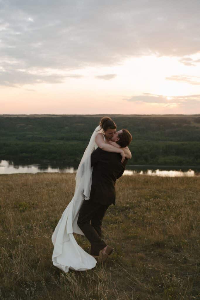 A newly married couple in the river hills at Blue Sky Ranch