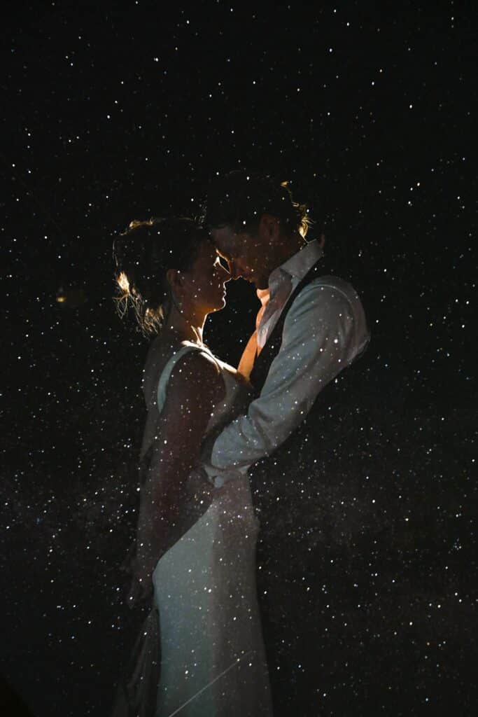 A newly married couple in the river hills at Blue Sky Ranch