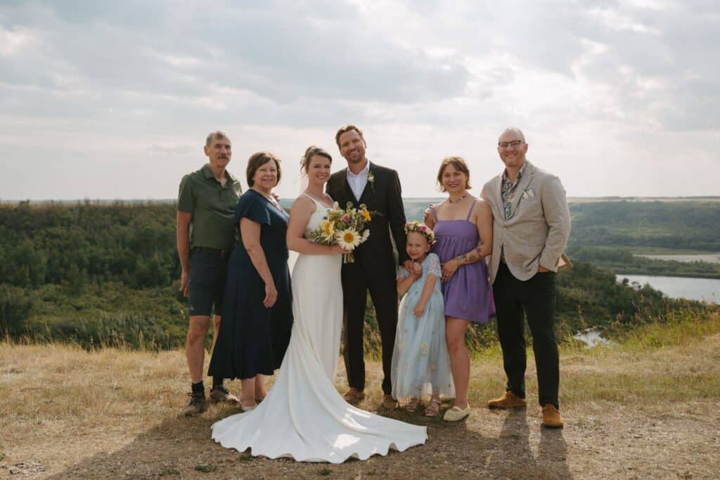 A newly married couple in the river hills at Blue Sky Ranch
