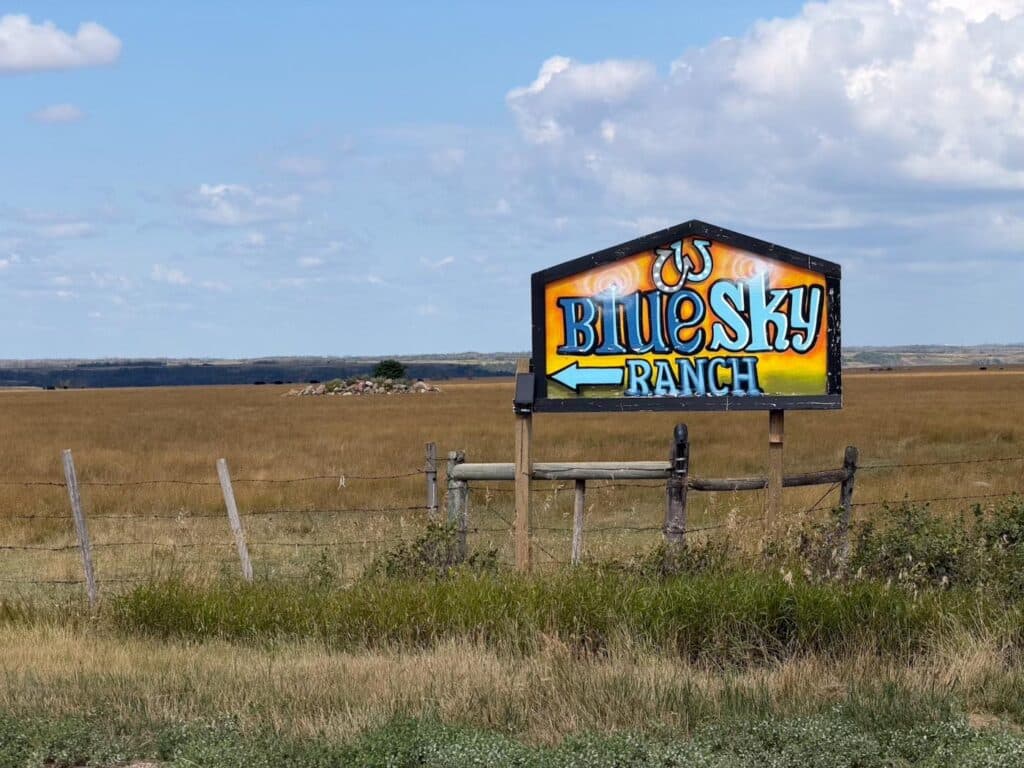 The Blue Sky Ranch sign at the roadside